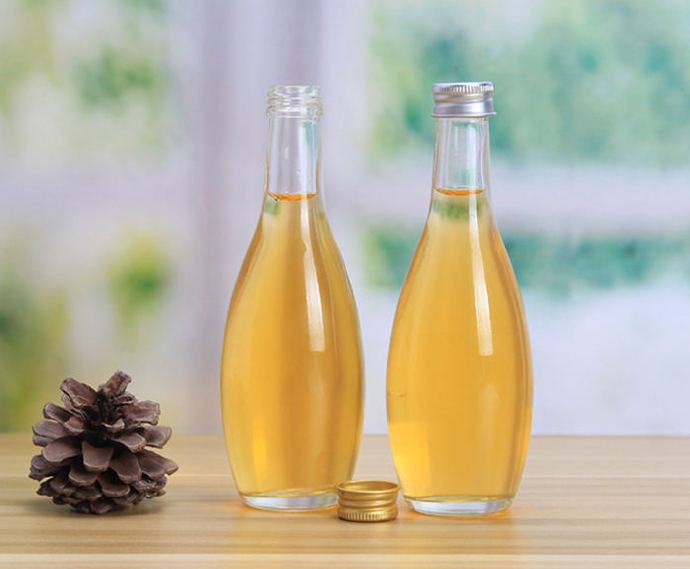 A method to improve the surface hardness and toughness of glass bottles